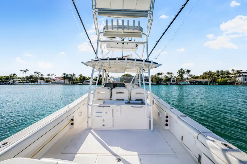 Slide: The Image of 2016 Stamas 390 Tarpon boat on water, featuring spacious deck and seating. - 38