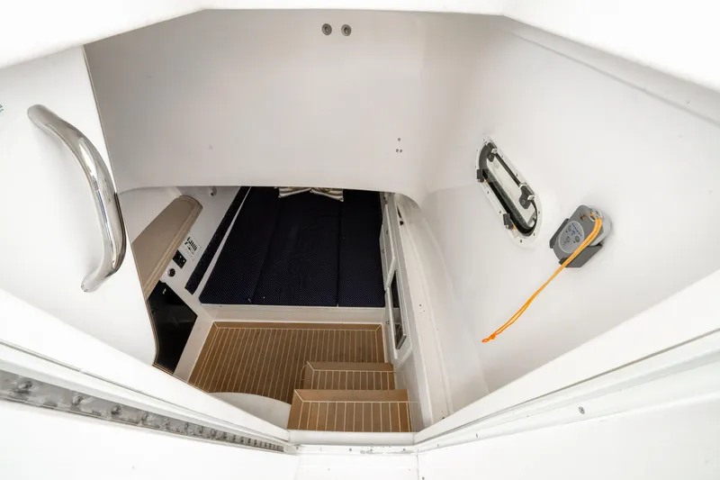 Slide: The Image of Interior cabin view of 2016 Stamas 390 Tarpon boat, featuring steps and modern design. - 45