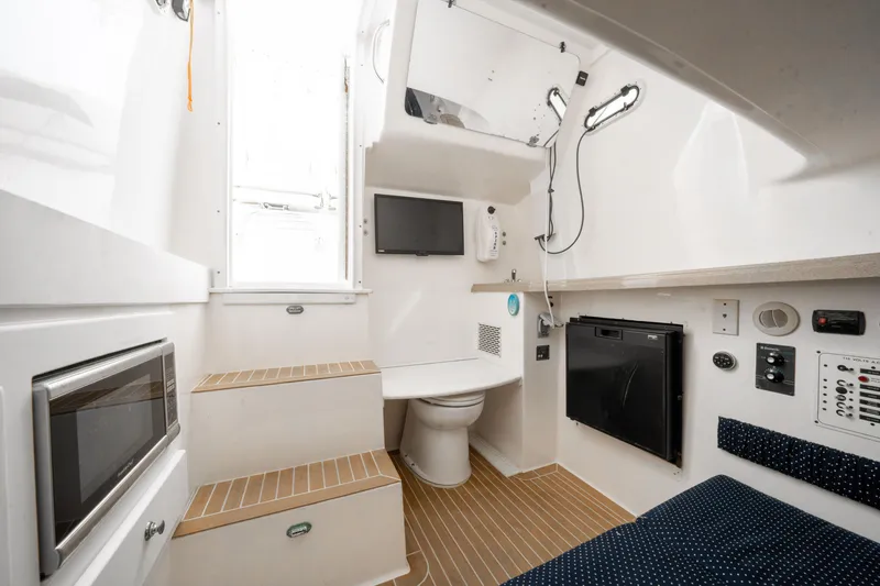 Slide: The Image of Interior of 2016 Stamas 390 Tarpon boat with modern amenities and compact design. - 48