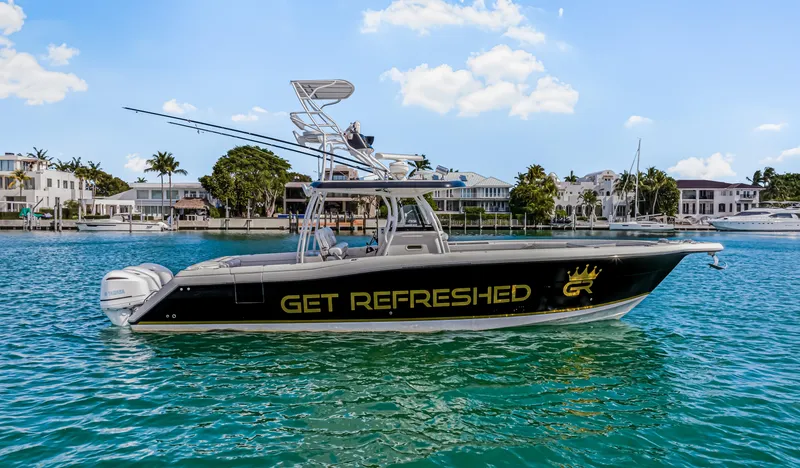 Slide: The Image of 2016 Stamas 390 Tarpon boat on water, featuring "Get Refreshed" branding. - 8