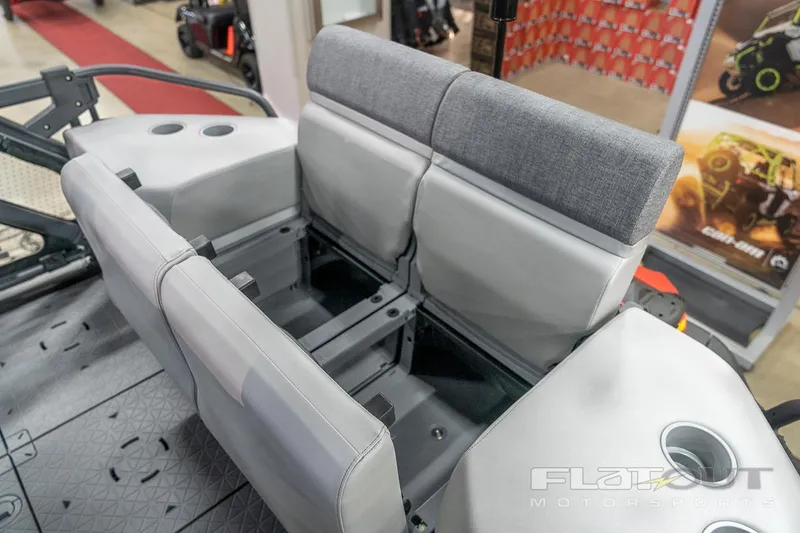 Slide: The Image of 2024 Sea-Doo SWITCH Cruise 21 interior seating, gray upholstery, cup holders, spacious design. - 13