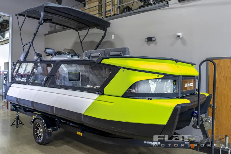 Slide: The Image of 2024 Sea-Doo SWITCH Cruise 21, 230HP, lime green, indoor display, trailer included. - 3