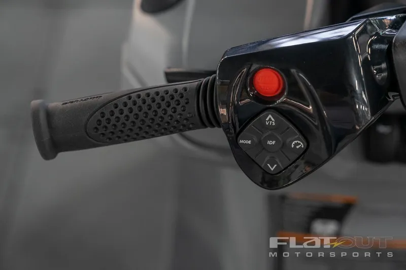 Slide: The Image of Close-up of 2024 Sea-Doo SWITCH Cruise 21 handlebar controls with buttons. - 38