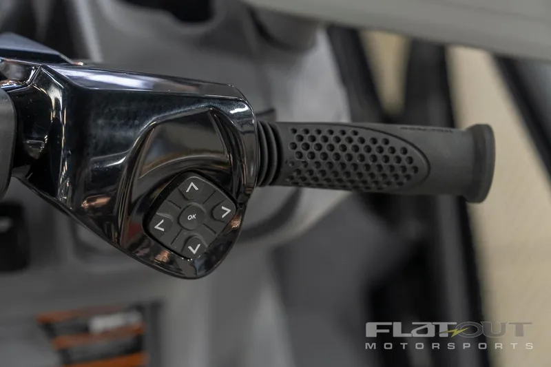 Slide: The Image of Close-up of 2024 Sea-Doo SWITCH Cruise 21 handlebar controls, showcasing ergonomic design. - 39