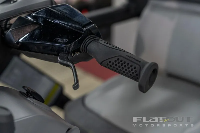 Slide: The Image of Close-up of 2024 Sea-Doo SWITCH Cruise 21 handlebar, showcasing ergonomic grip design. - 8