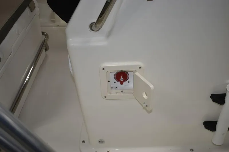 Slide: The Image of 2025 Key West 1720 CC boat interior with control panel and seating. - 16