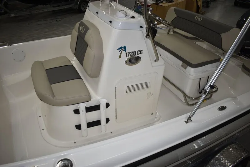 Slide: The Image of 2025 Key West 1720 CC boat interior with cushioned seating and console. - 20