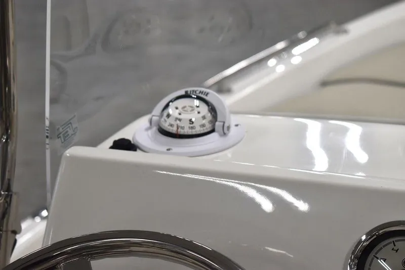 Slide: The Image of Compass on 2025 Key West 1720 CC boat dashboard. - 34