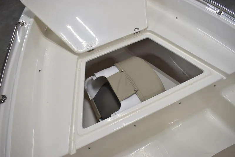 Slide: The Image of 2025 Key West 1720 CC boat storage compartment with open hatch. - 41