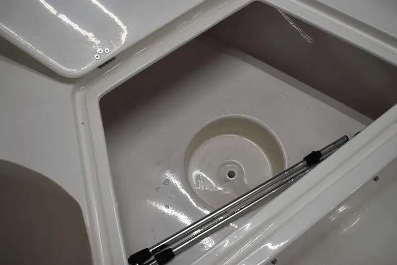 Slide: The Image of Key West 1720 CC 2025 boat storage compartment with hydraulic support. - 42