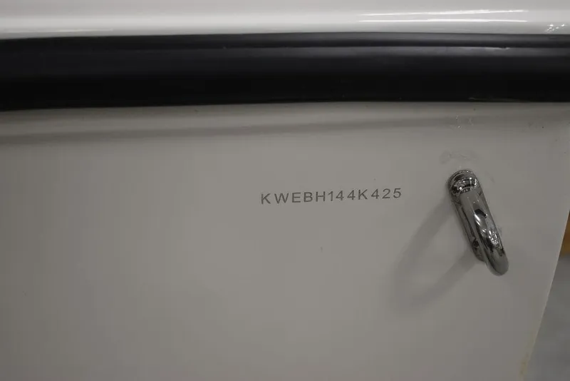 Slide: The Image of 2025 Key West 1720 CC boat hull identification number and cleat detail. - 48
