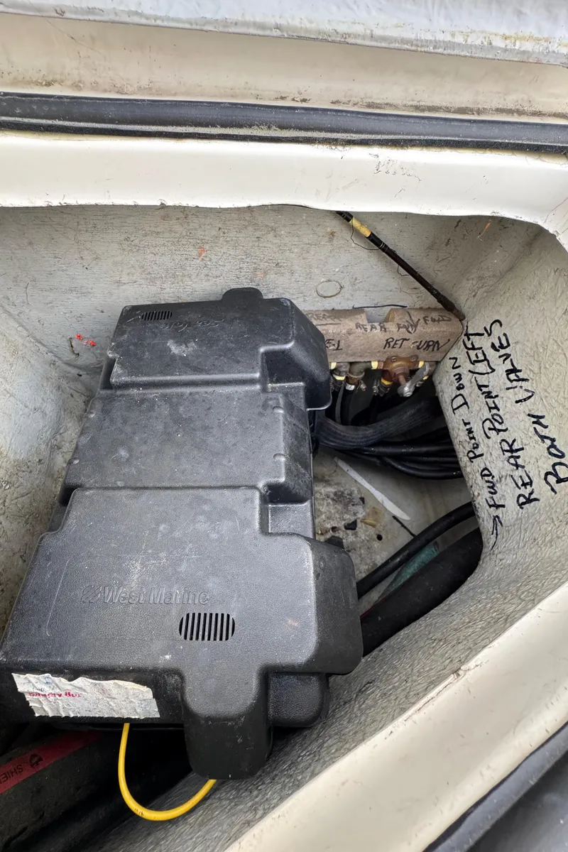 Slide: The Image of Battery compartment of 1999 Osprey 26 Legend boat with wiring and labels. - 17