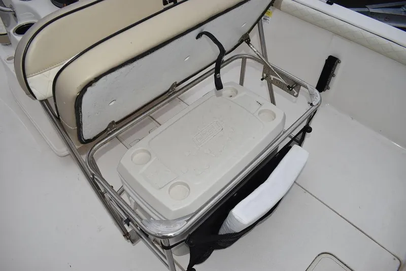 Slide: The Image of 2022 Carolina Skiff 19 LS boat seat with integrated cooler storage. - 22
