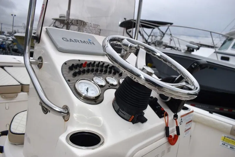 Slide: The Image of 2022 Carolina Skiff 19 LS boat dashboard with Garmin navigation system. - 25