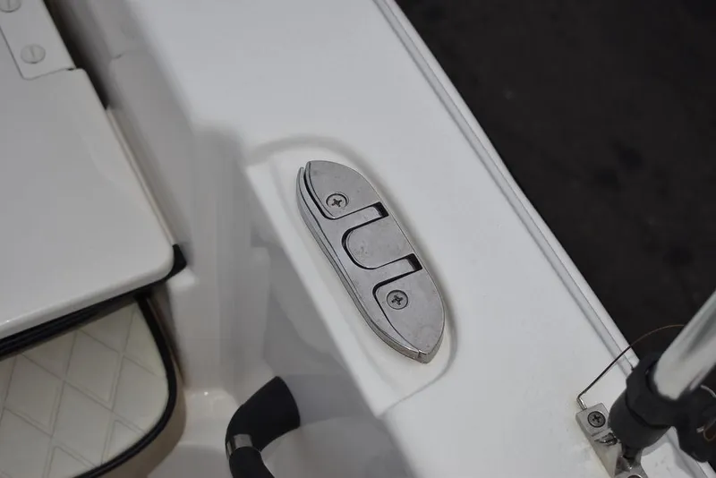 Slide: The Image of Close-up of a 2022 Carolina Skiff 19 LS boat cleat on white deck. - 40