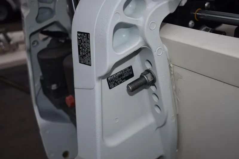 Slide: The Image of Close-up of 2022 Carolina Skiff 19 LS boat engine mount detail. - 44