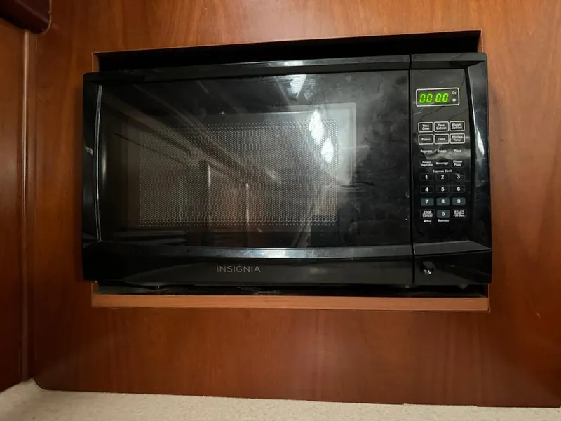 Slide: The Image of Insignia microwave in 2004 Beneteau Oceanis Clipper 473 yacht kitchen. - 30
