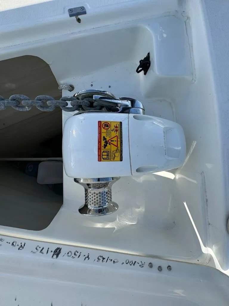 Slide: The Image of Anchor windlass on 2004 Beneteau Oceanis Clipper 473 sailboat. - 35
