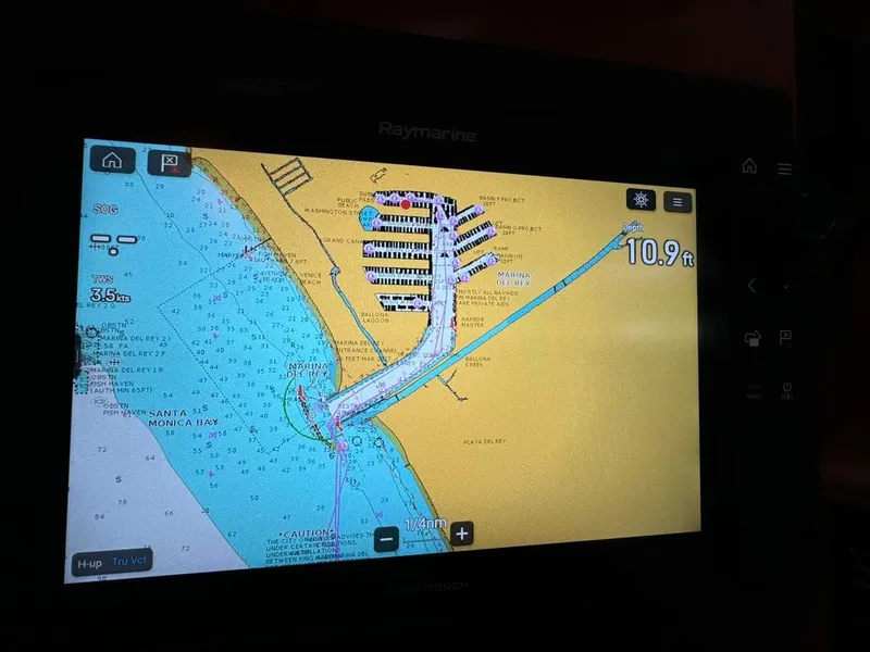 Slide: The Image of Raymarine navigation display on 2004 Beneteau Oceanis Clipper 473, showing marina map and depth. - 40