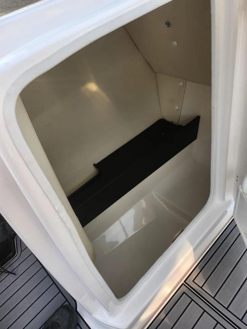 Slide: The Image of Storage compartment in 2016 Yamaha Boats 242X E-Series. - 13