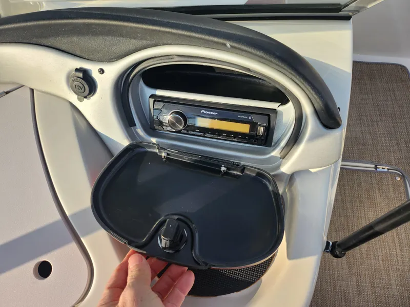 Slide: The Image of Dashboard of 2013 Nitro 290 Sport boat with Pioneer stereo system. - 16