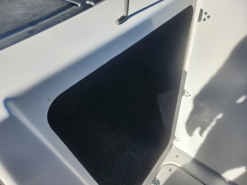 Slide: The Image of Storage compartment of 2008 Yamaha Boats 212SS, open and empty. - 17