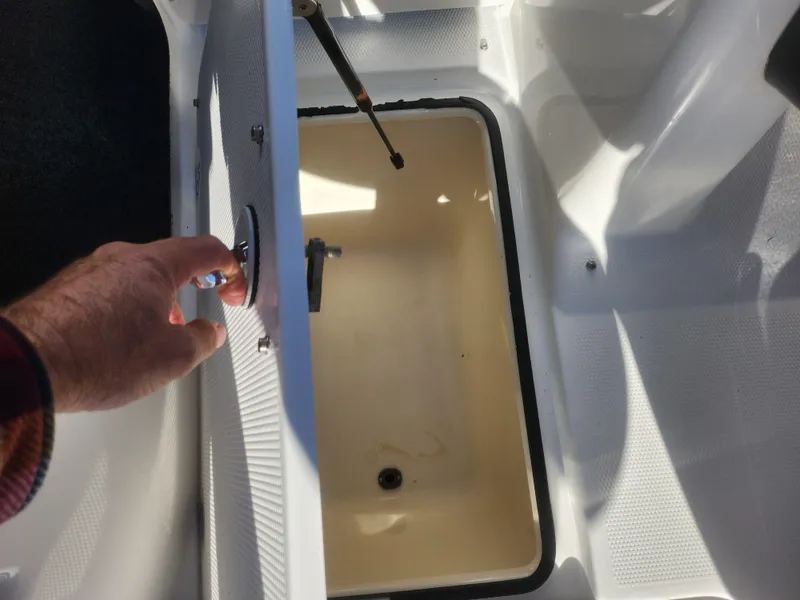 Slide: The Image of Open storage compartment on 2008 Yamaha Boats 212SS. - 18