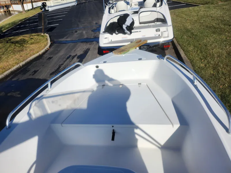 Slide: The Image of 2008 Sea King 180CC boat on trailer, parked in sunny lot. - 12