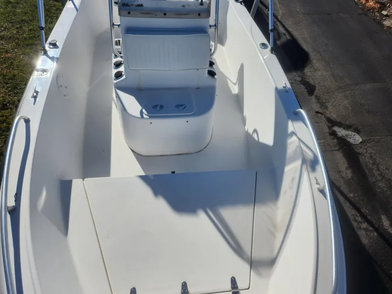 Slide: The Image of 2008 Sea King 180CC boat interior with seating and storage compartments. - 15