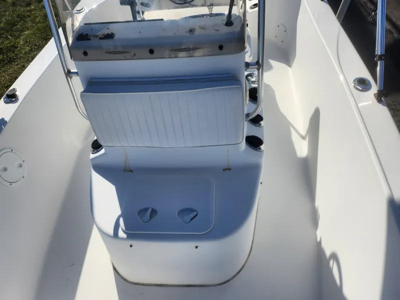 Slide: The Image of 2008 Sea King 180CC boat interior with white seating and console. - 17