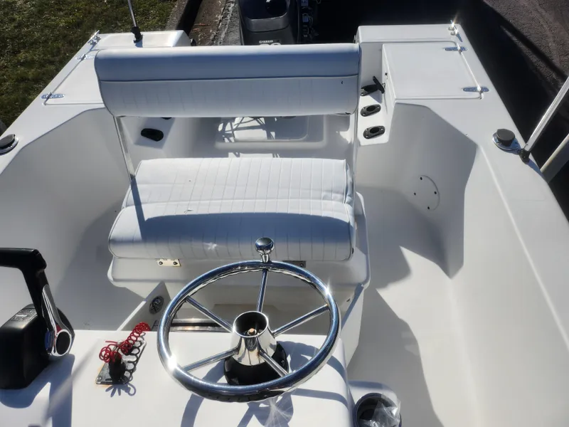 Slide: The Image of 2008 Sea King 180CC boat interior with steering wheel and seating. - 20