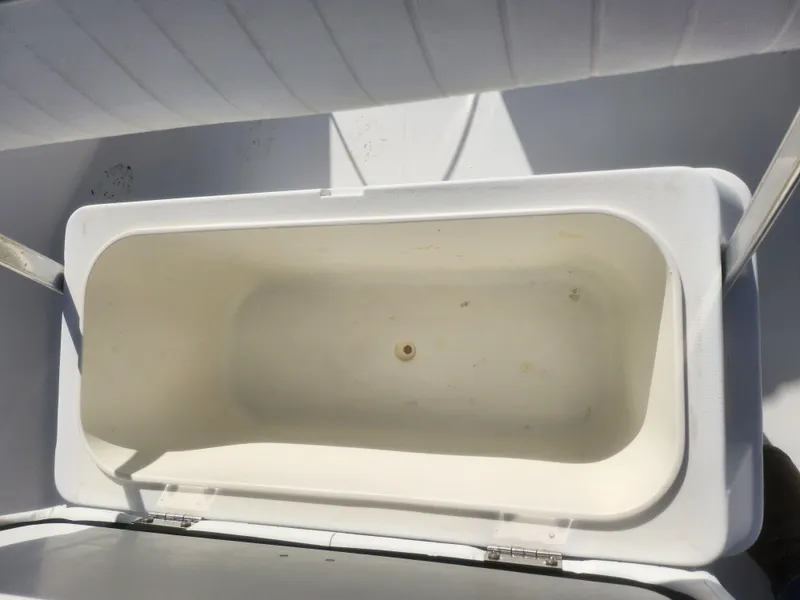 Slide: The Image of Open storage compartment on 2008 Sea King 180CC boat. - 21