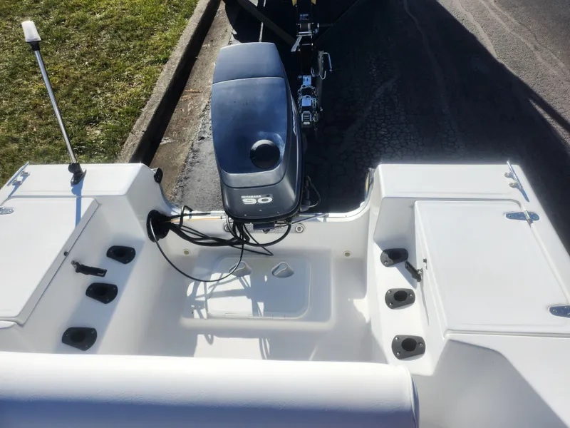 Slide: The Image of 2008 Sea King 180CC boat with outboard motor, viewed from above. - 22