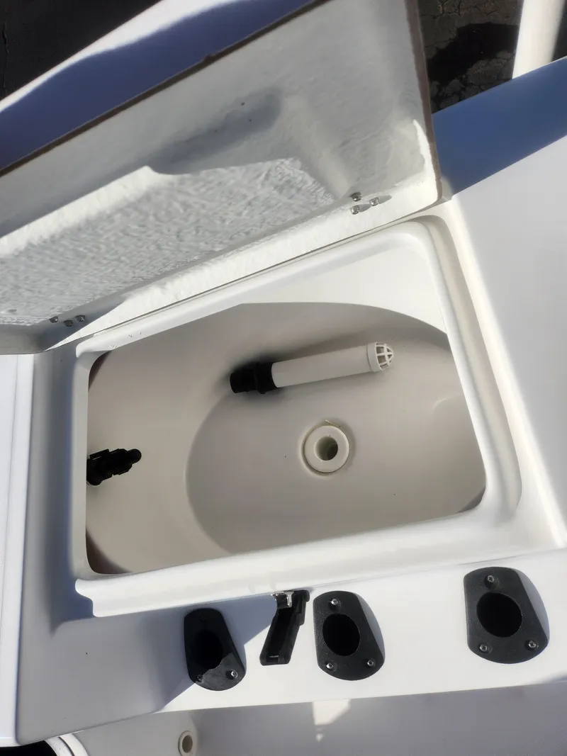 Slide: The Image of Open storage compartment on 2008 Sea King 180CC boat. - 23