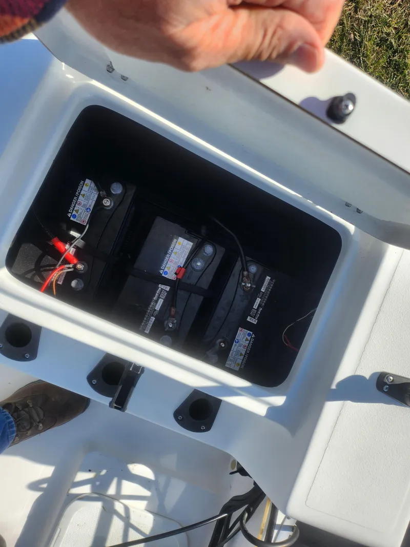 Slide: The Image of 2008 Sea King 180CC boat battery compartment with visible wiring. - 24