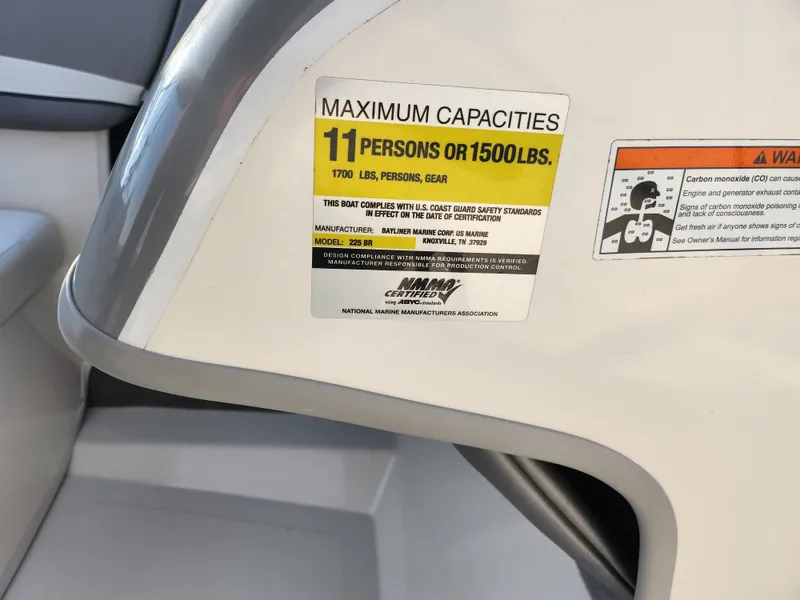 Slide: The Image of Bayliner 225 boat capacity label, 11 persons or 1500 lbs, 2007 model. - 15
