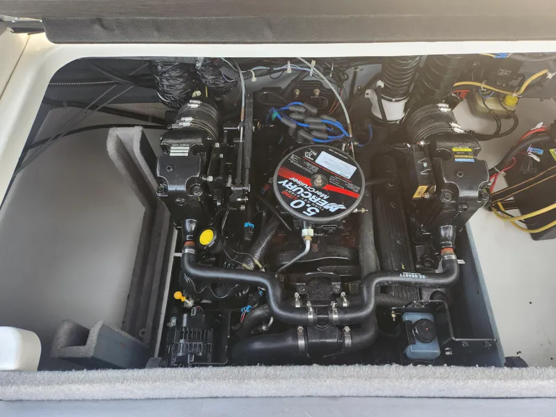 Slide: The Image of 2007 Bayliner 225 engine compartment with 5.0L MerCruiser engine, detailed view. - 23