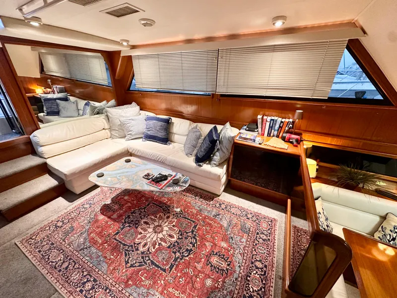 Slide: The Image of Luxurious interior of 1989 Viking 44 Motor Yacht with elegant seating and decor. - 15