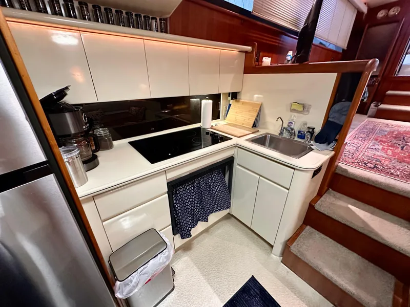 Slide: The Image of 1989 Viking 44 Motor Yacht kitchen with modern appliances and sleek cabinetry. - 21