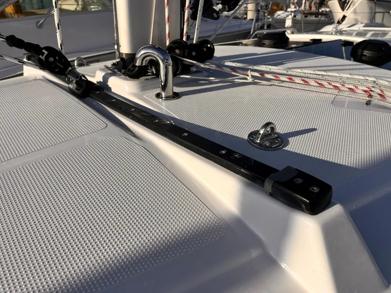 Slide: The Image of 2026 Hanse 348 yacht deck with rigging and fittings in sunlight. - 10