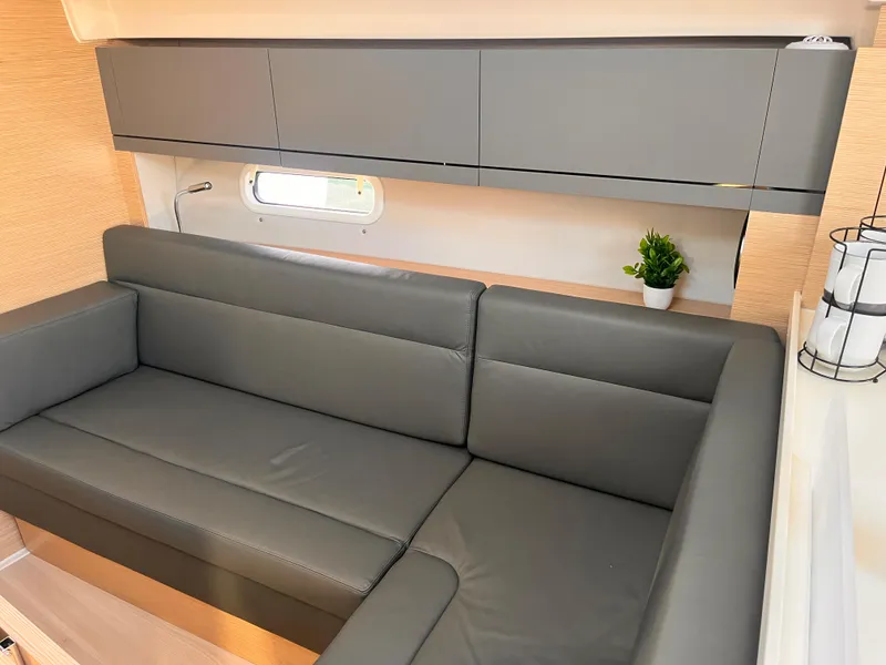 Slide: The Image of Modern interior of 2026 Hanse 348 yacht with sleek gray seating and cabinetry. - 20
