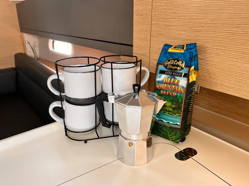 Slide: The Image of Coffee setup with mugs, moka pot, and Blue Mountain blend on Hanse 348 yacht. - 29