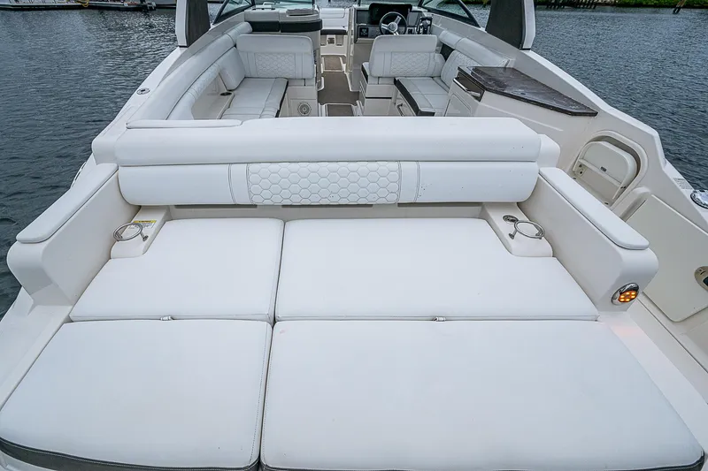 Slide: The Image of 2018 Sea Ray SDX 290 Outboard with spacious white seating and sleek design. - 23