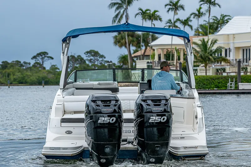 Slide: The Image of 2018 Sea Ray SDX 290 Outboard cruising on a scenic waterway. - 3