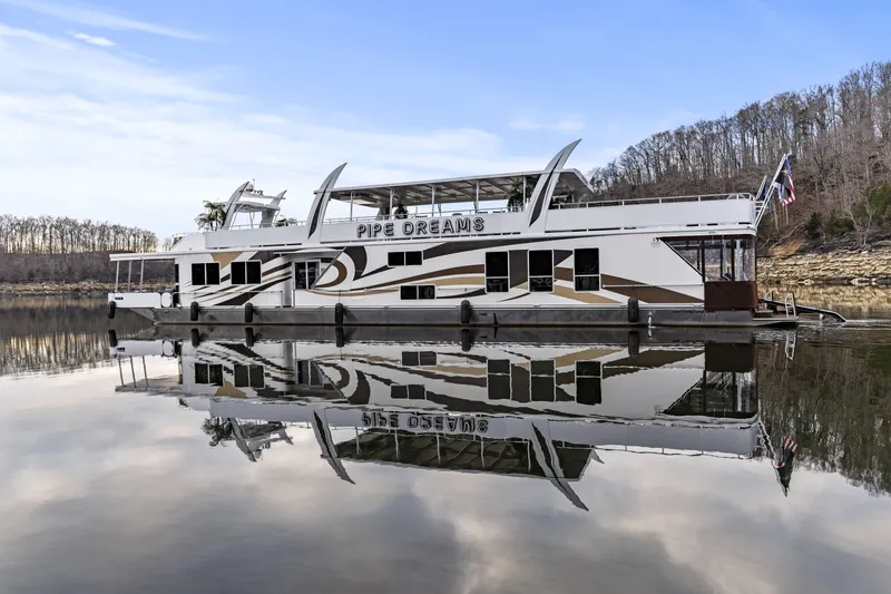 Slide: The Image of Houseboat "Pipe Dreams" on calm lake, Sharpe 20 x 100, 2009 model. - 2