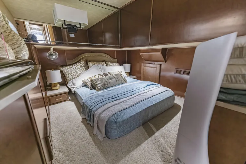 Slide: The Image of Cozy bedroom in 2009 Sharpe 20 x 100 houseboat with elegant decor and soft lighting. - 20