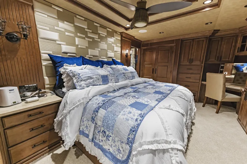 Slide: The Image of Luxurious bedroom in 2009 Sharpe 20 x 100 houseboat with elegant decor and cozy bedding. - 21