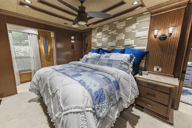 Slide: The Image of Luxurious bedroom in 2009 Sharpe 20 x 100 houseboat with elegant bedding and modern decor. - 22