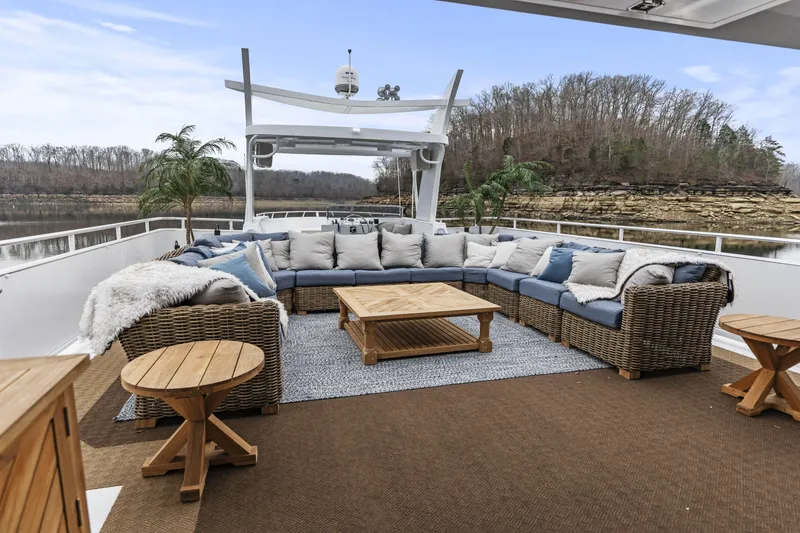 Slide: The Image of Luxurious outdoor seating on a 2009 Sharpe 20 x 100 houseboat, scenic river view. - 29