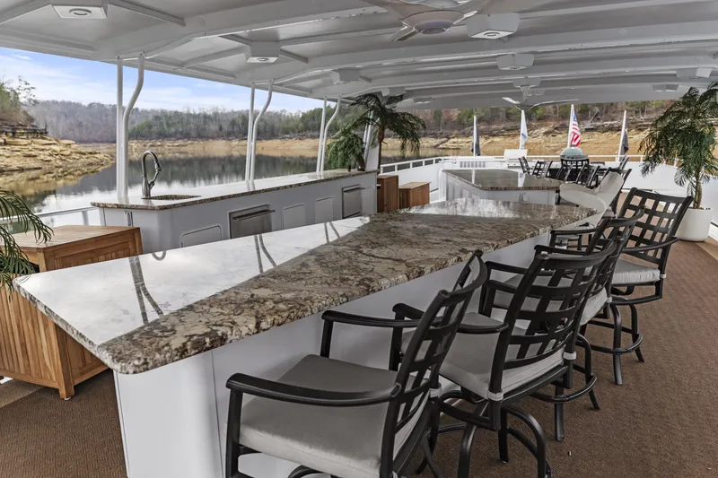Slide: The Image of Luxurious outdoor bar on a 2009 Sharpe 20 x 100 houseboat with scenic lake view. - 34